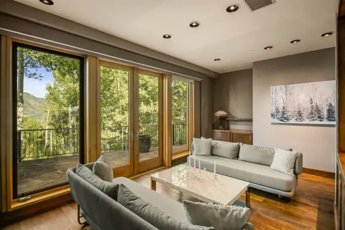 Wing 1 - Primary. Sitting room attached to primary bedroom with private porch.