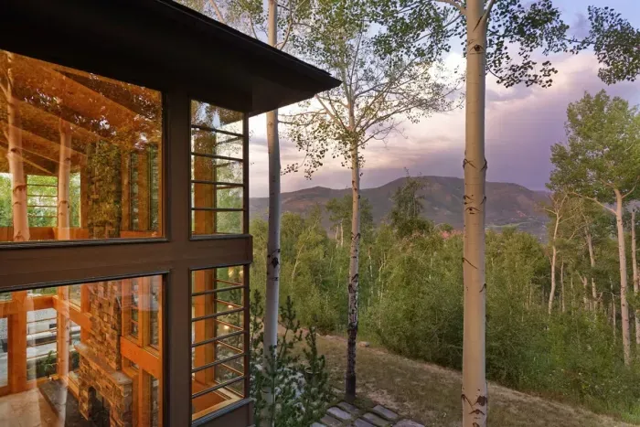 Floor-to-ceiling windows and multiple balconies to watch the sun set.