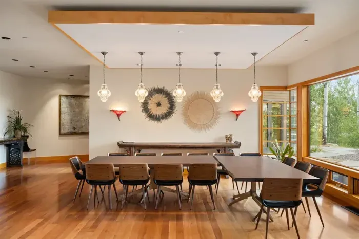 Expansive open-concept dining room with aspen tree valley views