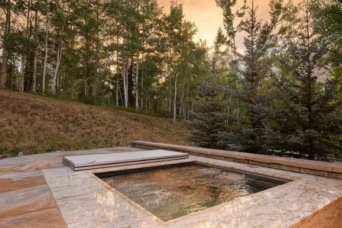 Hot tub connected to the first wing primary bedroom.