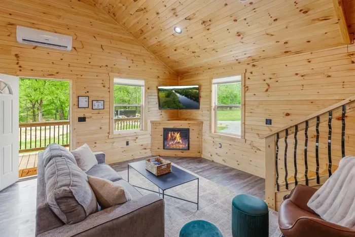 The Woodlands living room with ROKU TV and fireplace