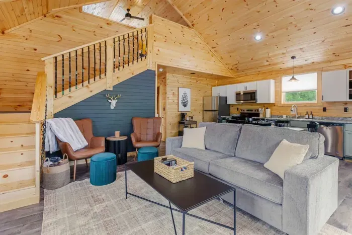 The Woodlands living room with queen size sleeper sofa